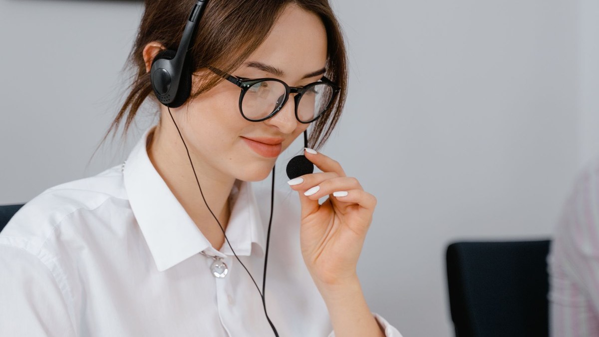 Small business website with AI chatbot, WhatsApp, CRM, and human support handoff workflow