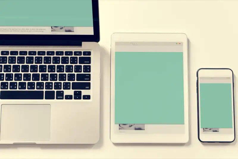 Responsive web design shown across mobile, tablet, and desktop devices